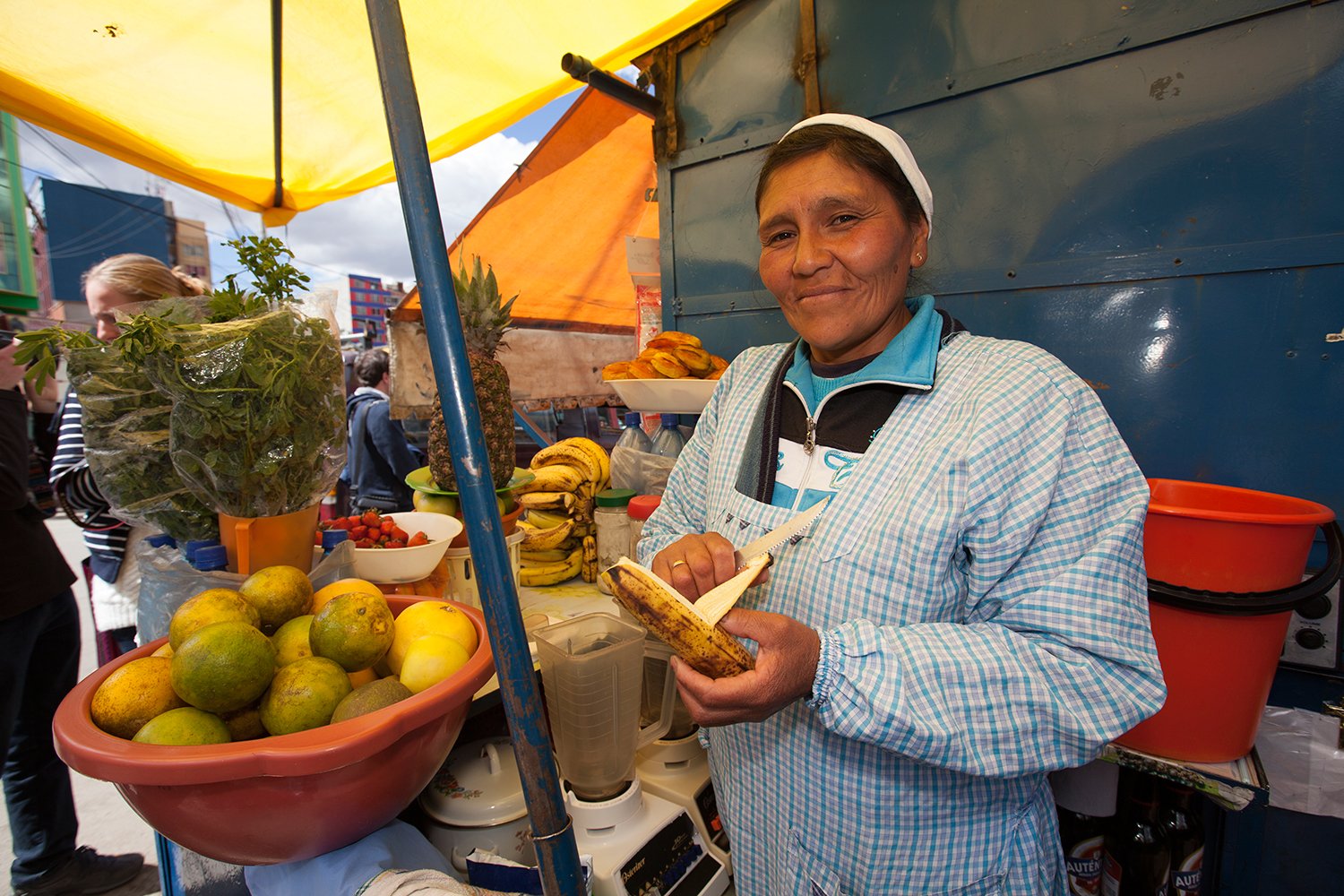 One of Banco Fie’s clients in La Paz: Betty Sebacollo. Betty sells juice in Mercado Rodríguez.